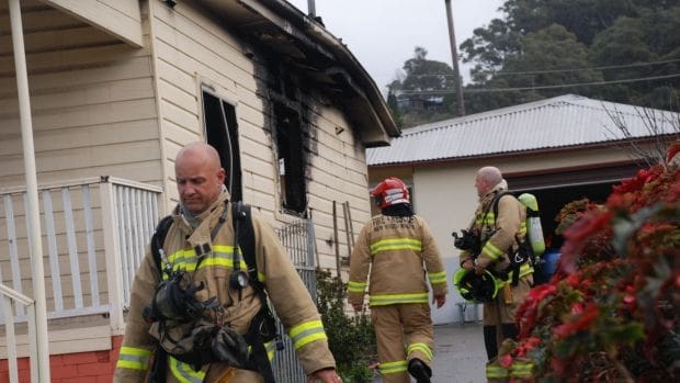 Kovacevski's fire started "there", he indicated to firefighters by pointing to a folder filled with divorce documents.  Image: Illawarra Mercury